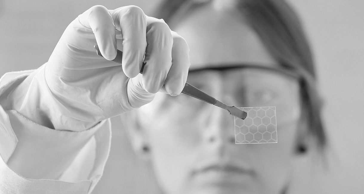 Image of a scientist handling nanomaterials