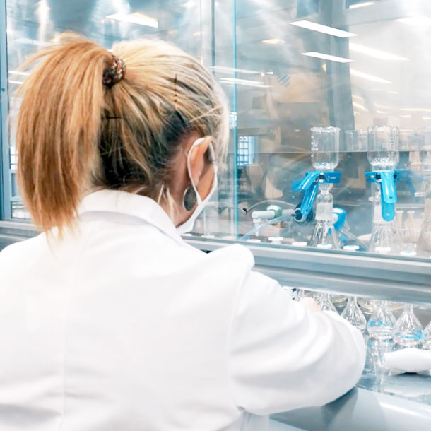 A scientist at work with Burdinola fume cupboards