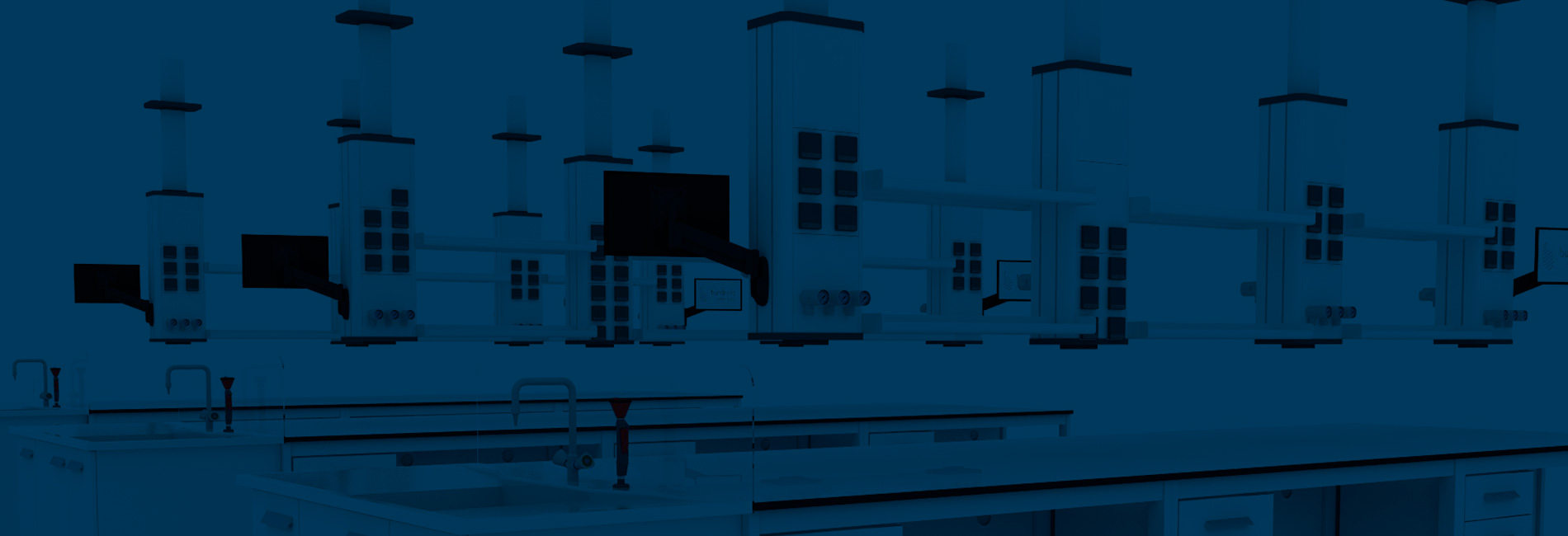 Image bleue d’un laboratoire conçu par Burdinola avec des systèmes de services suspendus au plafond