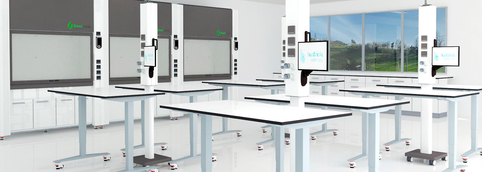 Image of the inside of a laboratory designed by Burdinola with movable recirculating fume cupboards and movable or ceiling-mounted service systems.